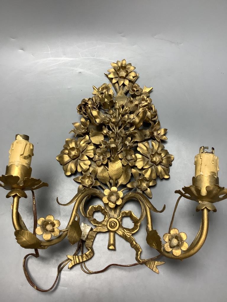 A gilt floral and foliate wall sconce, a pair of brass candlesticks and three various glass light shades (6)